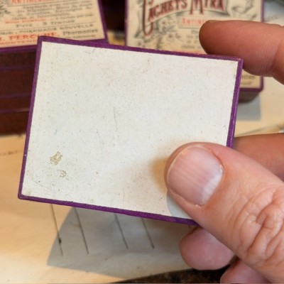Eau de Chaux Médicinale - Antique labels in a pharmacy box for remedy in canvas cardboard